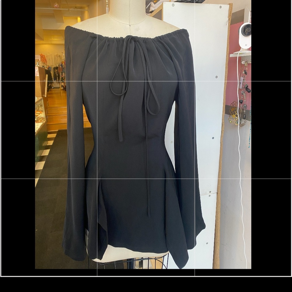 Ivan grundahl blouse fits like size 8